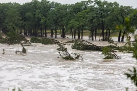 At least 1 summer camp evacuates, others monitoring as life-threatening floods strike the Hill Country